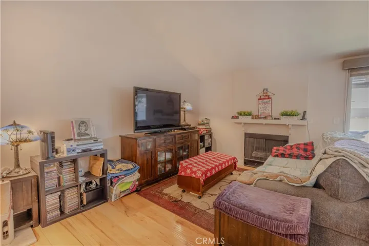 Living area has vaulted ceilings and gas fireplace