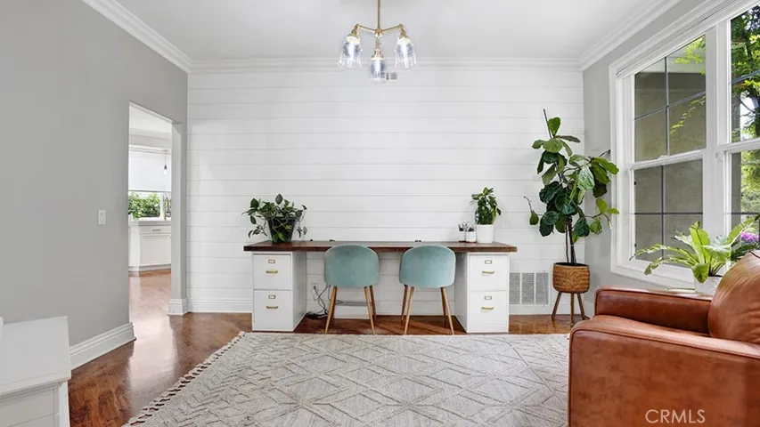 Multi-function room: dining, office, den or study space.