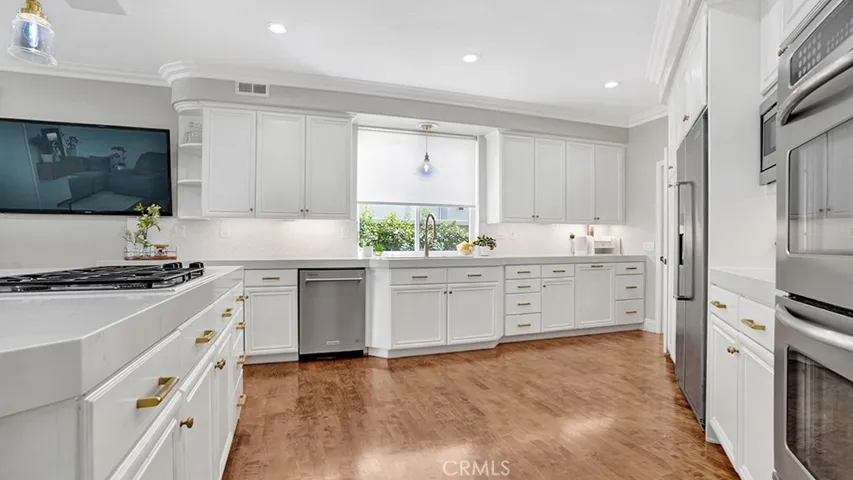Remodeled Kitchen with Island and Plenty of Storage.