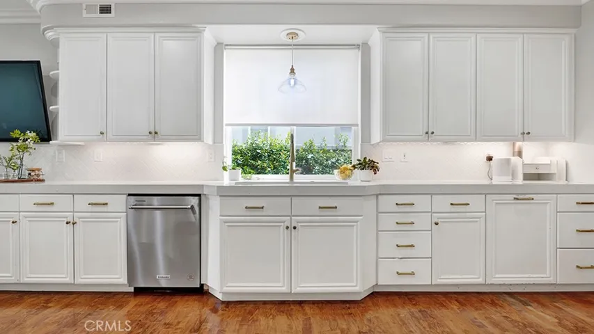 Remodeled Kitchen with Island and Plenty of Storage.