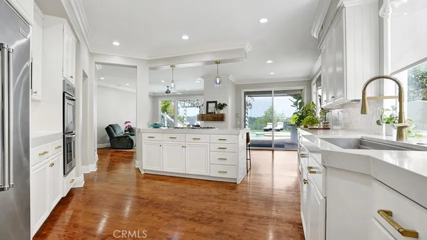 Remodeled Kitchen with Island and Plenty of Storage.