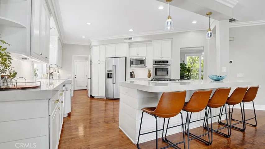 Remodeled Kitchen with Island and Plenty of Storage.
