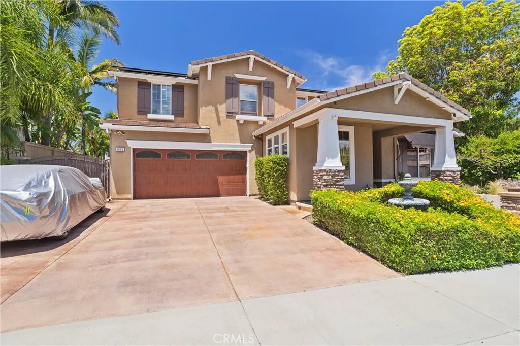 Spacious driveway offers ample parking for multiple vehicles