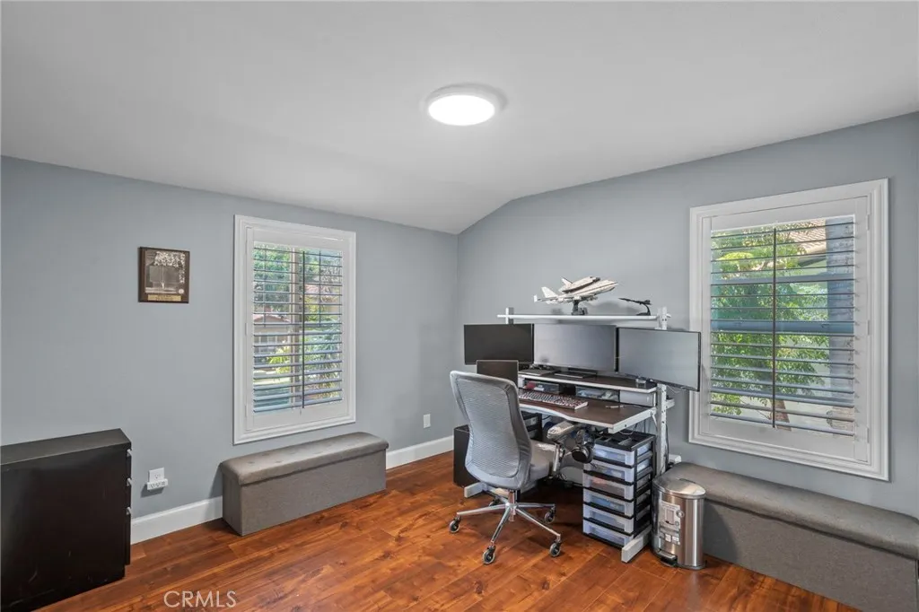A flexible bedroom provides options for work, study, or guests