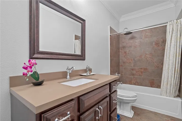 Well-appointed downstairs bathroom offers everyday convenience