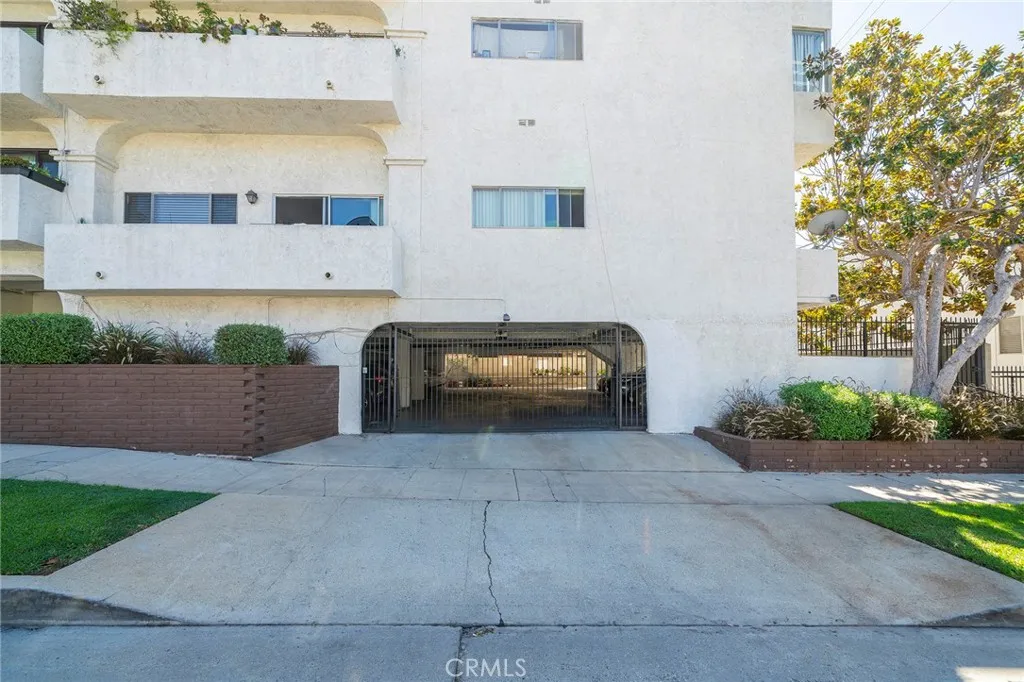 Side entrance to the gated garage parking from Massachusetts Ave.