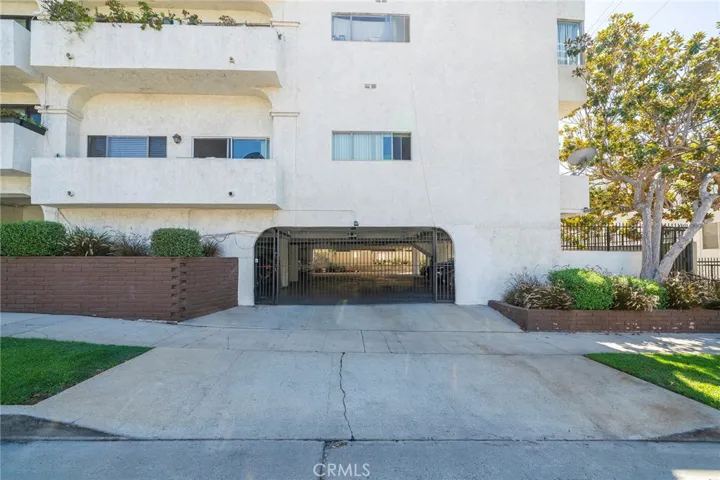 Side entrance to the gated garage parking from Massachusetts Ave.