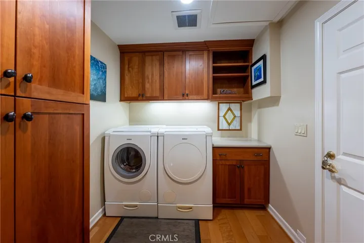 Downstairs laundry in guest unit