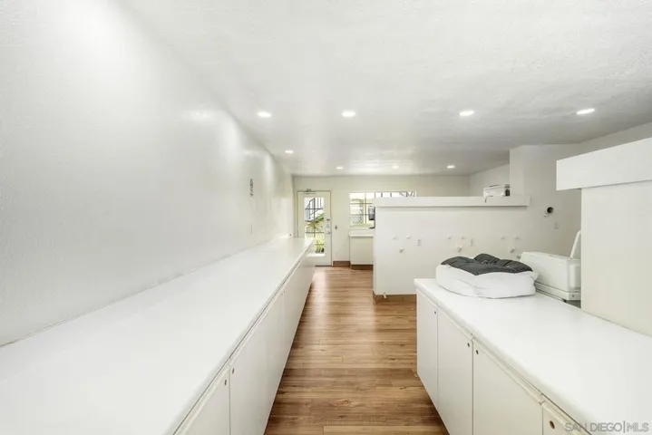 The community also has a shared laundry room if needed. Very conveniently located just steps away from the unit's stairway.