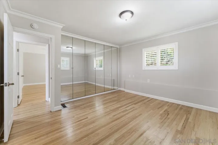 Bedroom with private ensuite (tub/shower combo).
