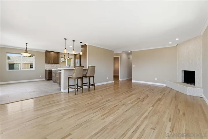 Large open space living room with gas fireplace. Light and bright with gorgeous views.