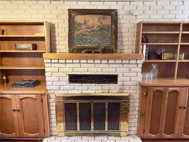 Fireplace in den/dining