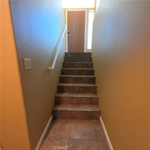 Stairs from basement to front door