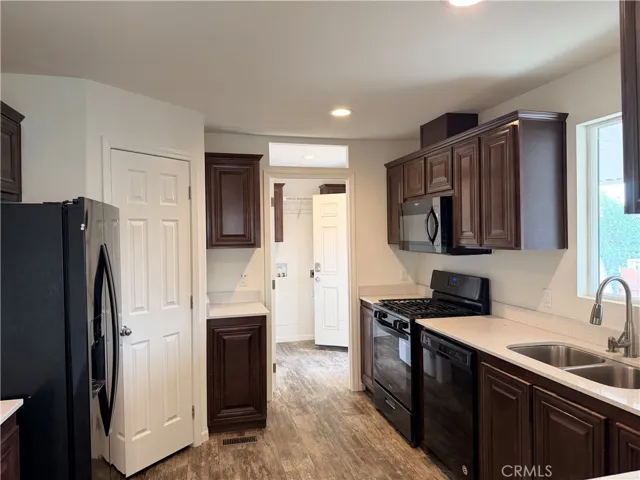Looking into kitchen from Living room towards back door