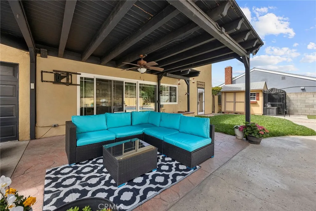 Covered patio area. Bonus storage shed .