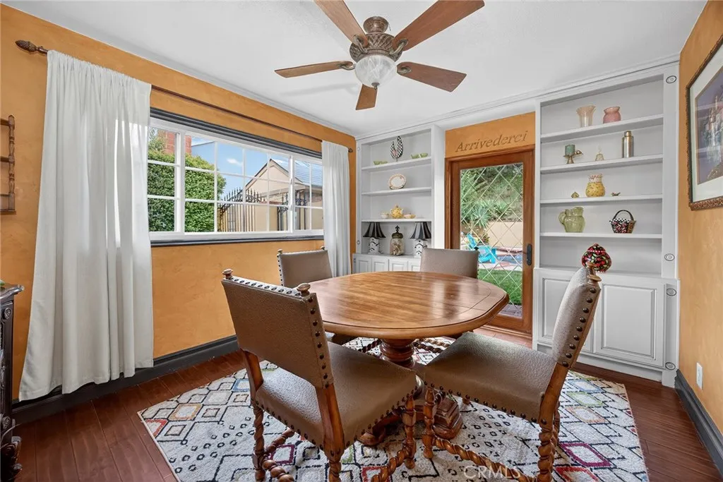 formal Ding room with a door that leads to the backyard