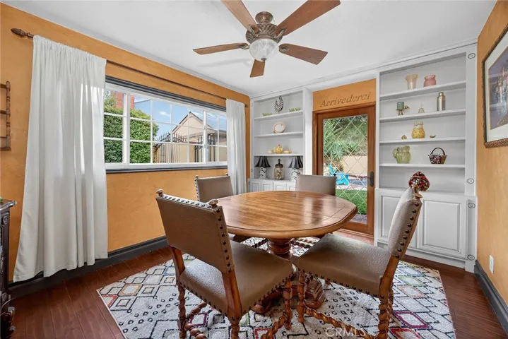 formal Ding room with a door that leads to the backyard