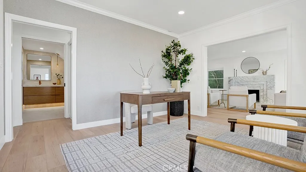 Main floor bedroom with a walk-in closet & adjoining bath