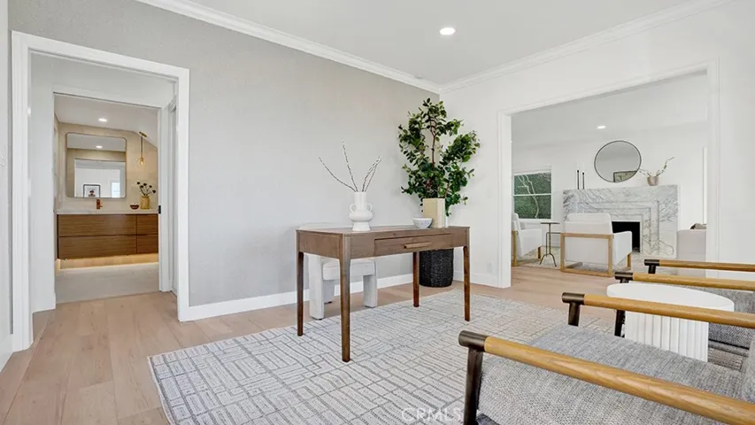 Main floor bedroom with a walk-in closet & adjoining bath