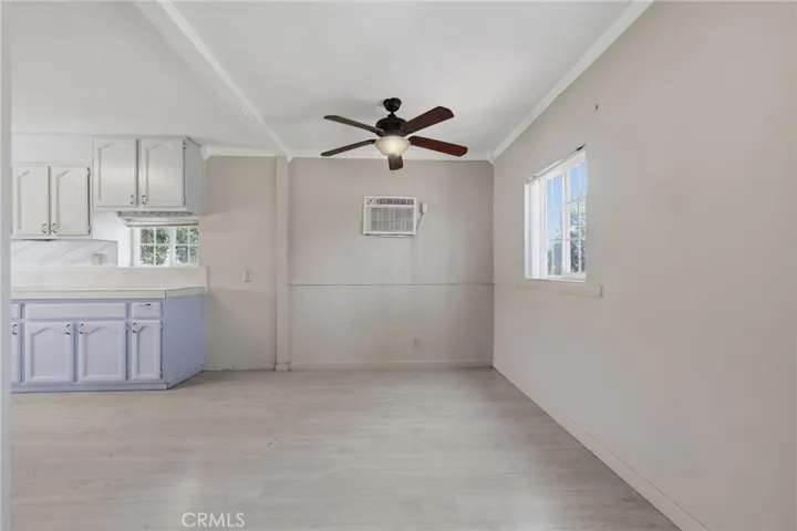 Dining room open to both the living room and kitchen, creating a seamless flow for everyday living and entertaining.