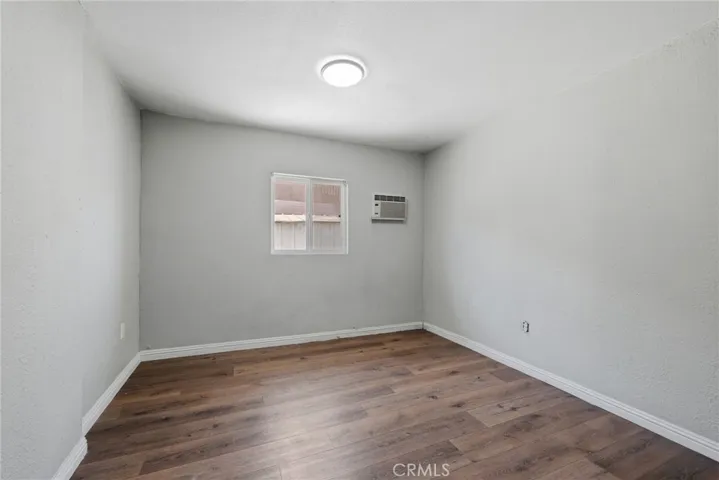 Bedroom-style space within the converted bonus area, offering flexible use for guests, office, or extended living.