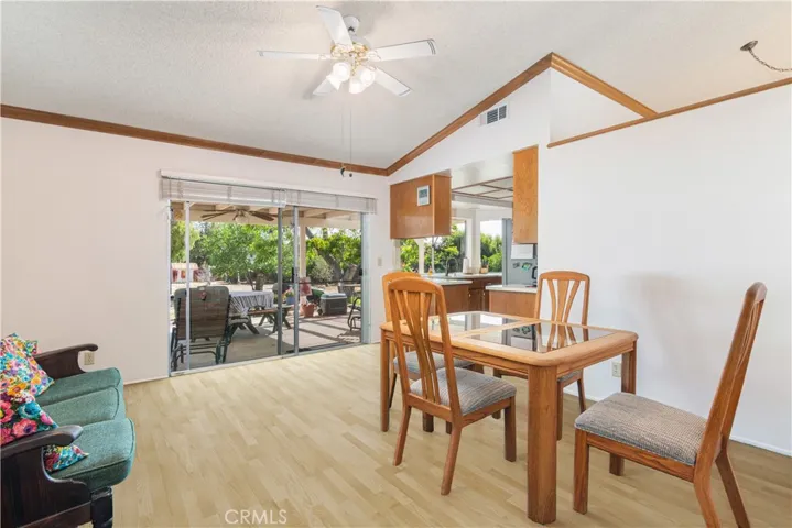Virtually staged with vinyl plank flooring- seller willing to give a credit for new flooring.