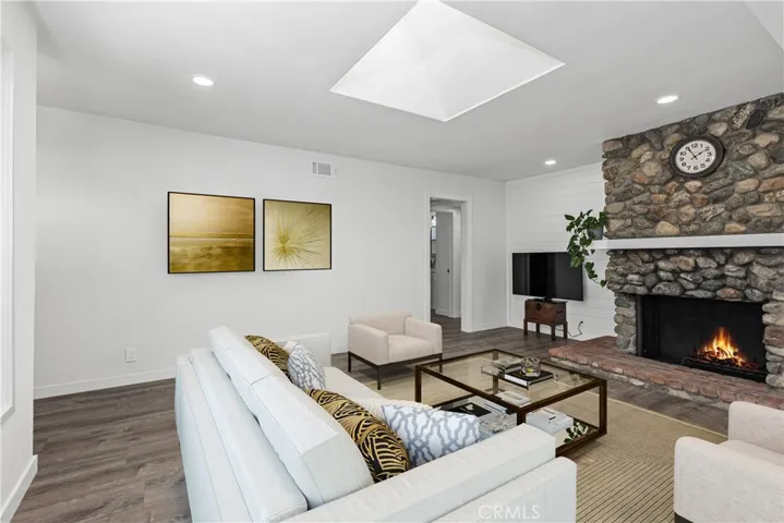 Living area with fireplace.  Digitally enchanced photo.