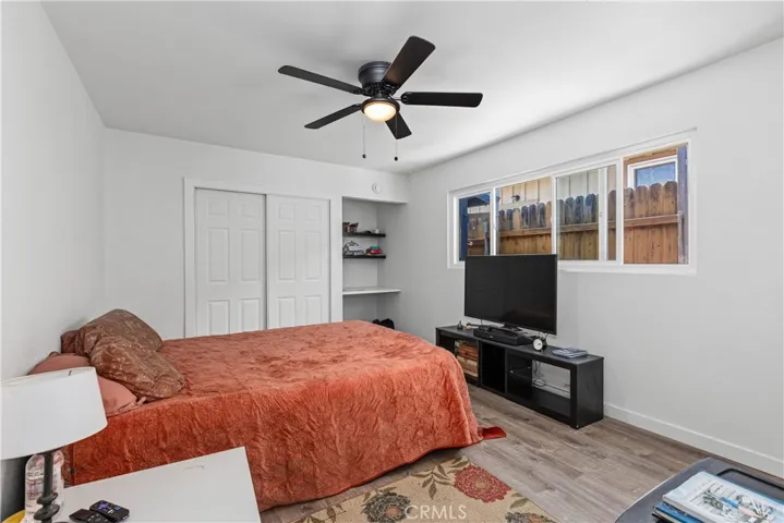 Large third bedroom with new flooring and closet.