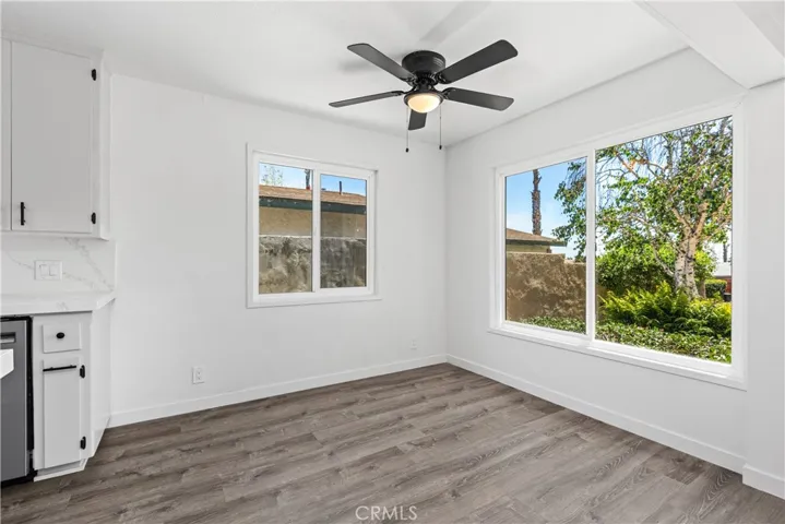 Dining area off kitchen.  Big windows with lots of natural light.