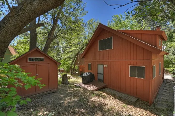 Rear Exterior With An 8x12 Storage Shed
