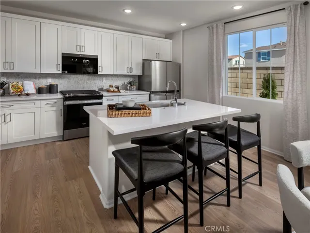Photo is not of the actual home, but is an inspirational photo of builder’s model home and may depict options, furnishings, and/or decorator features that are not included