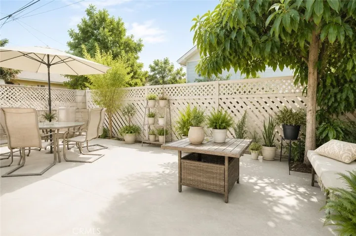 This image has been digitally enhanced to illustrate the patio's potential with minor upgrades.