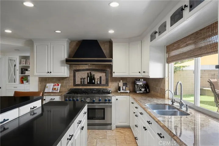 Chef's kitchen with premium appliances and custom cabinetry