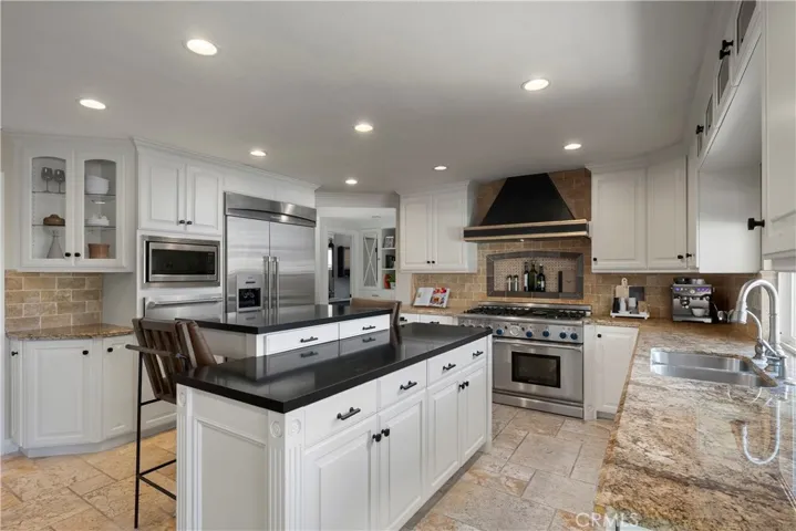 Chef's kitchen with oversized island and premium appliances