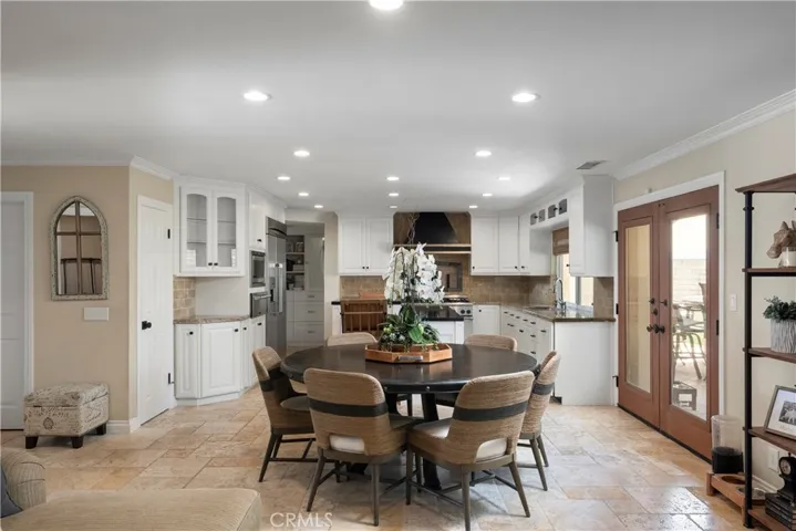 Spacious dining area seamlessly connected to the chef's kitchen