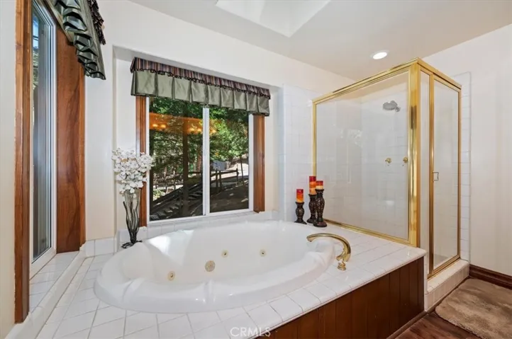 Primary Bath With Spa Tub and Separate Walk-in Shower