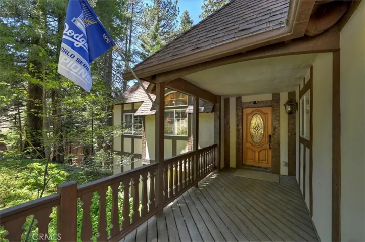 Covered Front Entry With Trex Deck.