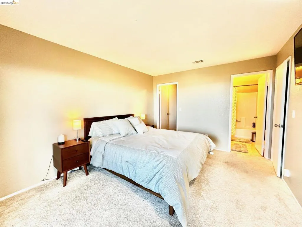 Master Bedroom with bathroom access and a huge walk in closet.