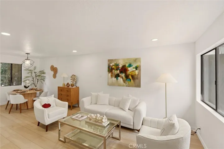 Living room with luxury vinyl plank flooring.