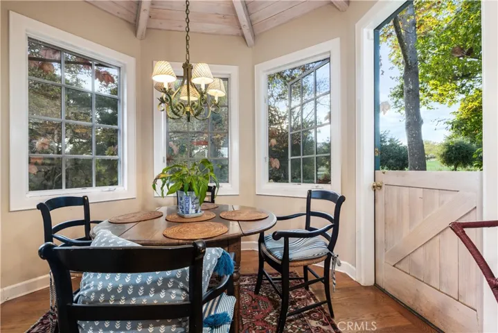 Inviting breakfast nook with a dutch door to the rear yard.