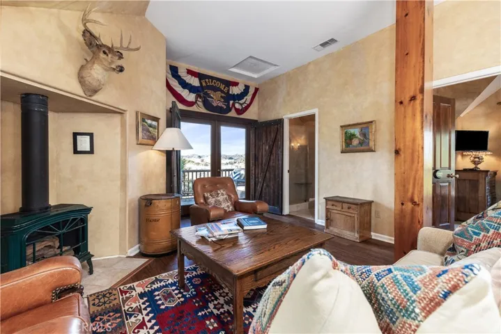 French doors lead out to a private balcony.
