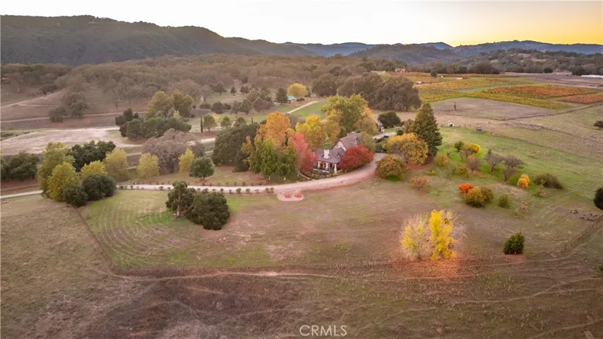 Spectacular hills and stately oaks in the backdrop of this stunning property.