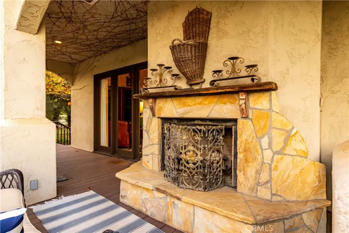 Outside wood burning fireplace.