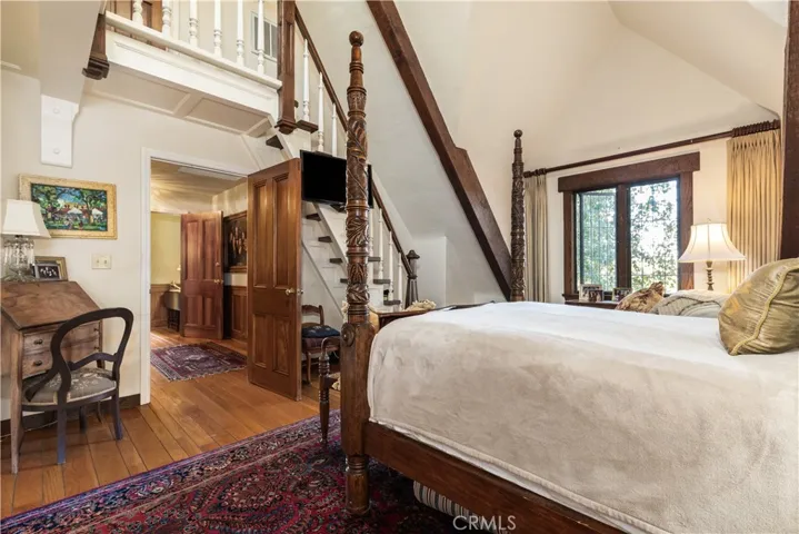 The primary bedroom features its own
private staircase leading to a unique loft
— a versatile space full of character and
possibility.