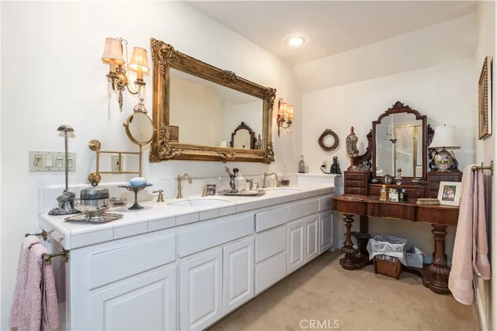 Double sink vanity in primary bathroom.