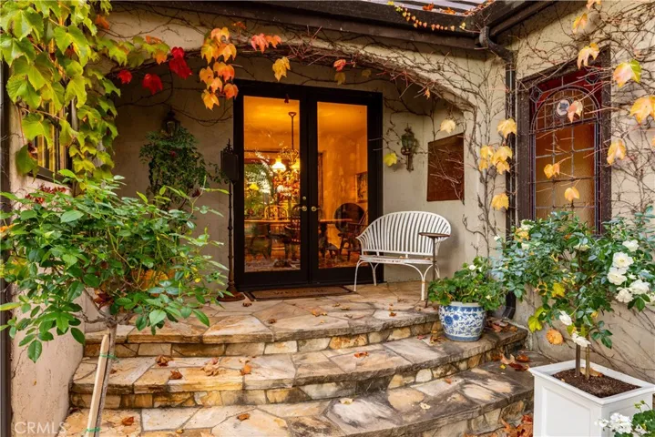 French doors off the dining room access additional outdoor seating areas.