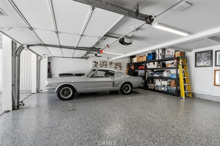 Oversize garage with plenty of room for storage.