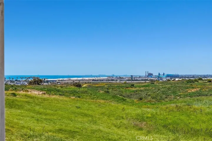This balcony view photo has been digitally enhanced for a greener open space.