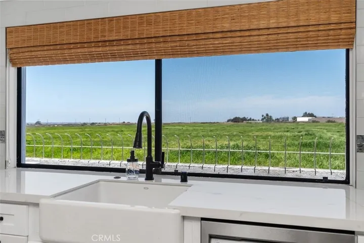 This photo has been digitally enhanced for a greener open space highlighting the Kitchen Window views.