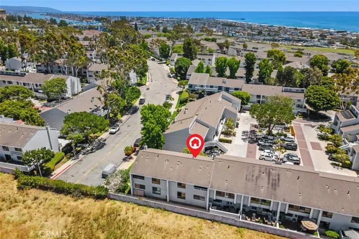 Drone photo showing their Balcony and windows which face the Randall Preserve and Sunset Views.